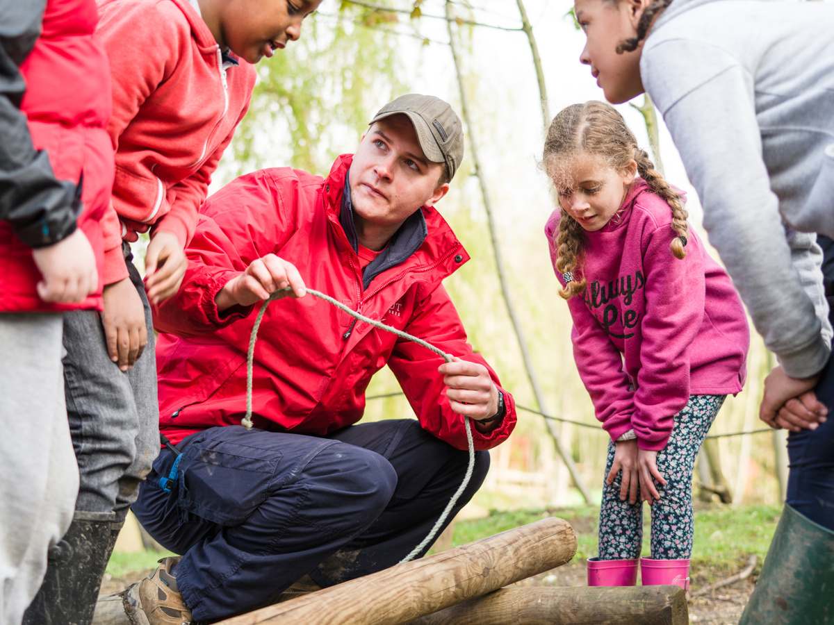 Adult Leader Teaching Rope Skills Jpg